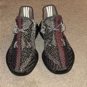 Yeezy Yechiel reflective size 9. Great shoe and goes with anything.